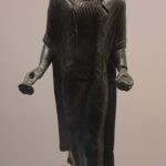 vrouwelijk brons uit een put bij Bologna